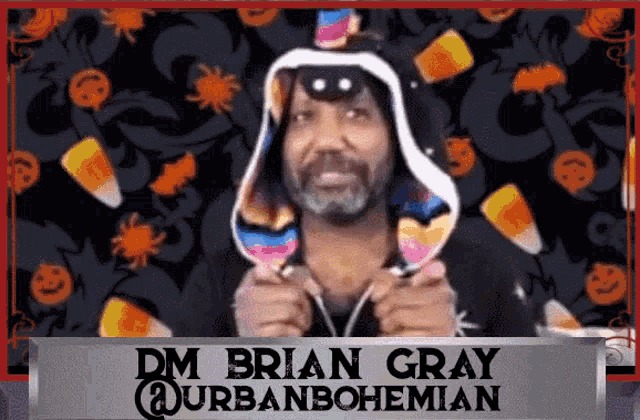 dm brian gray is wearing a hooded hat with candy corn on it