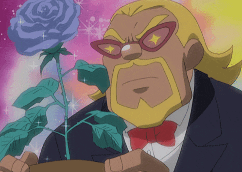 a man in a tuxedo holds a blue rose