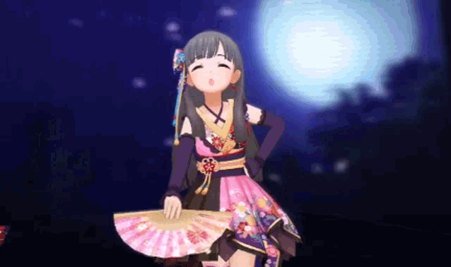 a girl in a kimono holds a fan in her hand