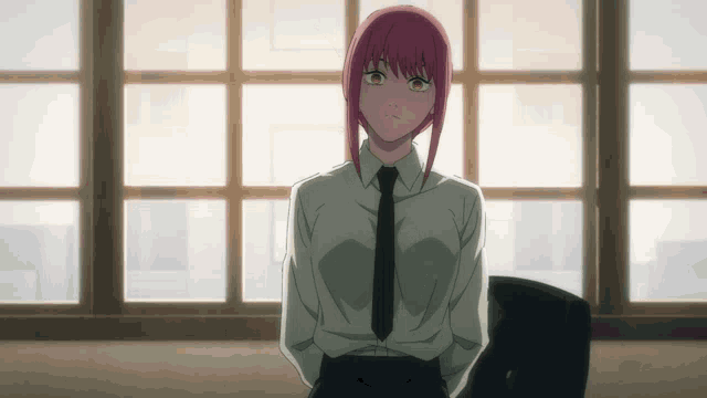 a girl with pink hair and a white shirt and tie stands in front of a window