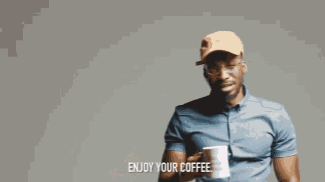 a man is holding a mug that says the answer is love