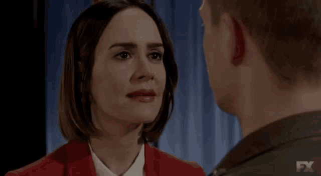 a man and a woman are looking at each other and the woman says a nasty woman fx