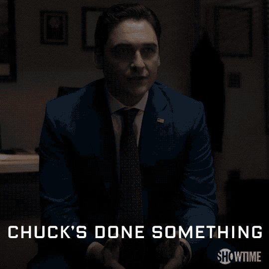 a man in a suit and tie with the words chuck 's done something on the bottom