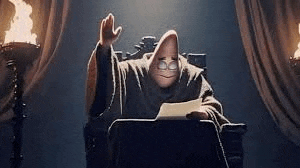 patrick star from spongebob squarepants is sitting in a chair reading a book .