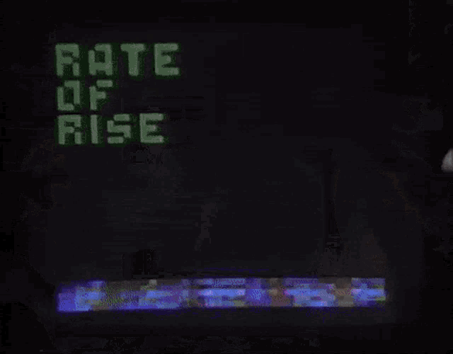 a man and a woman are playing a video game with the words rate of rise on the screen
