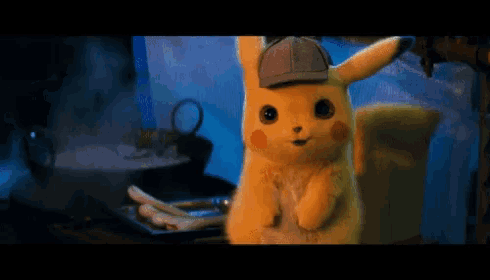 a stuffed pikachu wearing a hat stands in front of a pot of boiling water