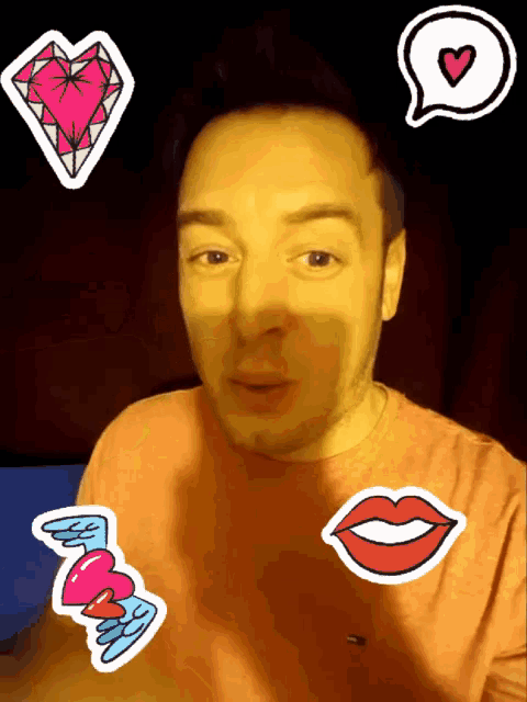 a man with stickers on his face including one that says ' i love you '