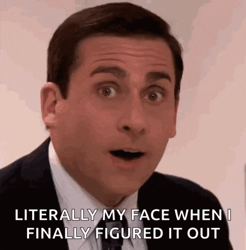 a man in a suit and tie is making a surprised face .