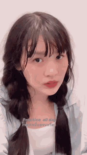 a girl with braids and the words practice all day on her face