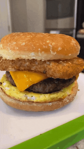 a close up of a hamburger on a bun