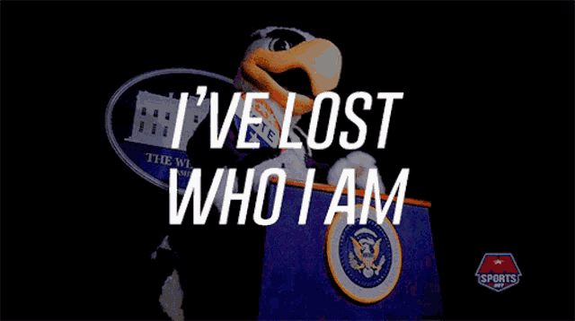 a mascot stands at a podium with the words " i 've lost who i am "