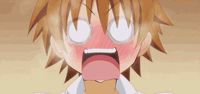 a close up of a girl 's face with her eyes closed