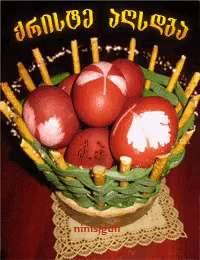 a basket filled with red eggs and pretzels with a foreign language written on the bottom