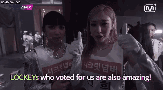 two girls are standing next to each other with the words " lockeys who voted for us are also amazing " on the bottom