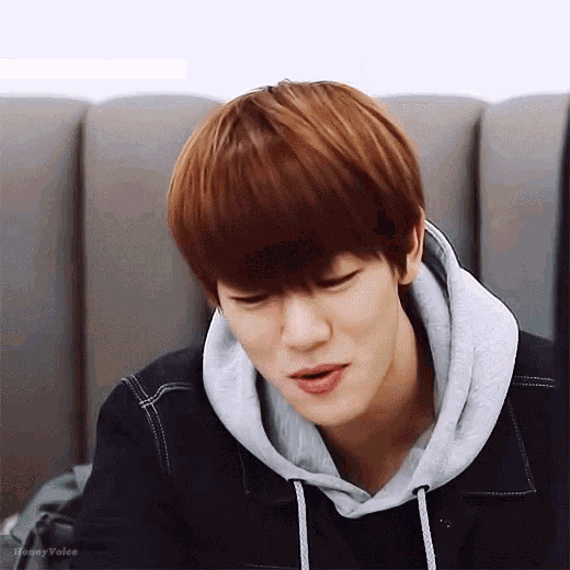 a close up of a person 's face with the words honey voice written below it