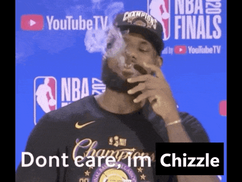a man is smoking a cigar in front of a youtube tv banner