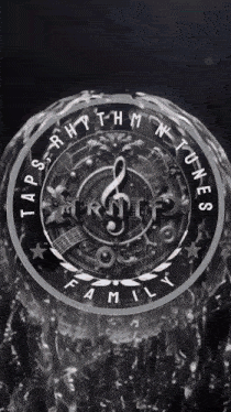 a black and white logo for taps rhythm and tunes family
