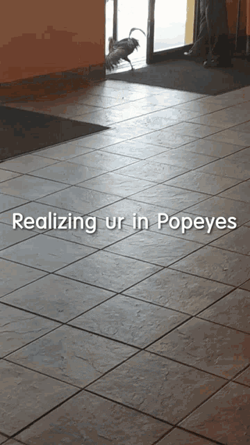 a tiled floor with the words realizing ur in popeyes written on it