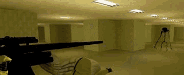 a person is holding a sniper rifle in a room with a tripod .