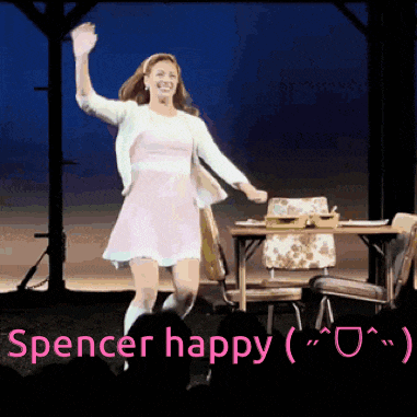 a woman in a pink dress is dancing on a stage with the words " spencer happy " above her