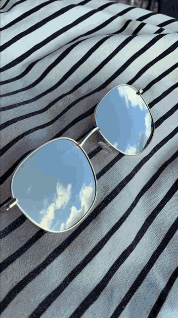 Clouds Sunglasses GIF - Clouds Sunglasses Cinemagraph GIFs