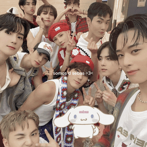 a group of young men posing for a picture with the words somos d sebas > 3 < on the bottom