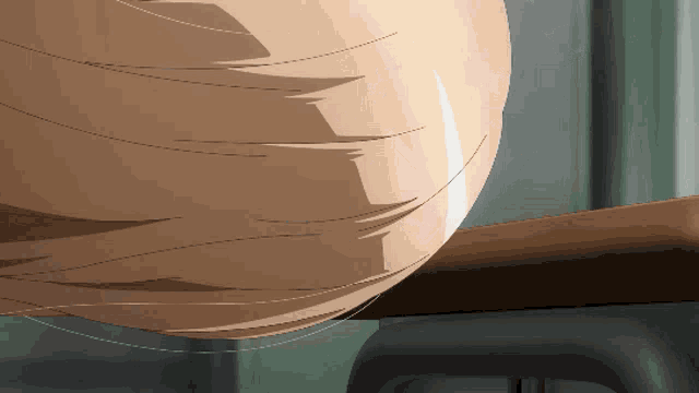 a close up of a person 's torso with a green curtain behind them
