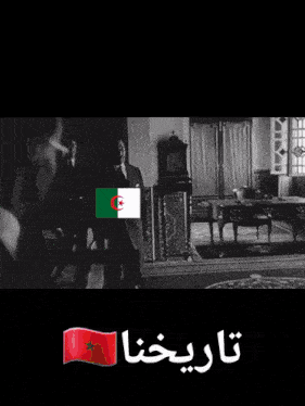 a black and white photo of a man in a suit and tie with a flag of algeria and a red flag of morocco