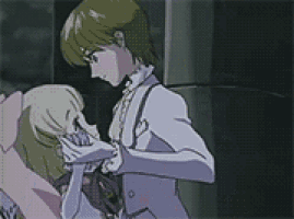 a man and a woman are standing next to each other .