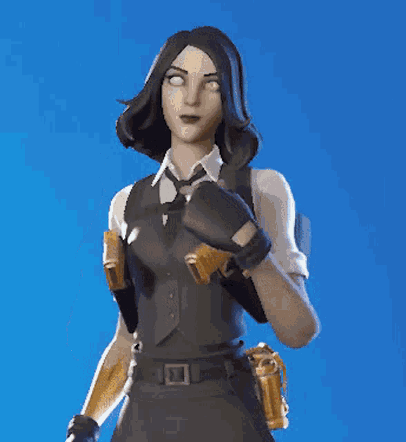 a woman in a suit and tie is holding a gun in her hand .