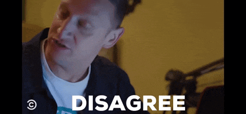 a man is making a disagree sign with his mouth