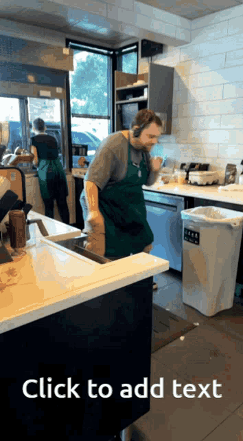 a man in a green apron is standing in a kitchen with a sign that says click to add text below him