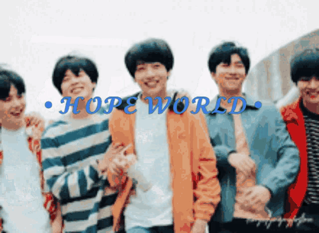 a group of young men standing next to each other with the words hope world written in blue