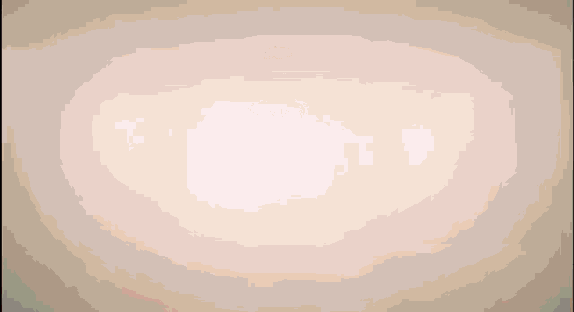 a blurred image of a person 's face with a red background