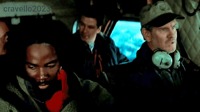 a group of men are sitting in a car and the number cravello2023 is on the bottom