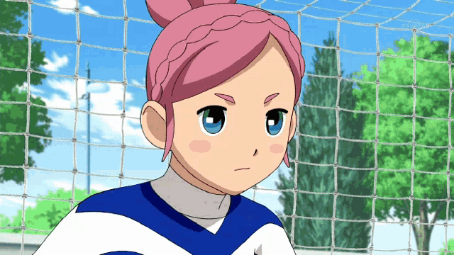 a girl with pink hair and blue eyes stands in front of a net