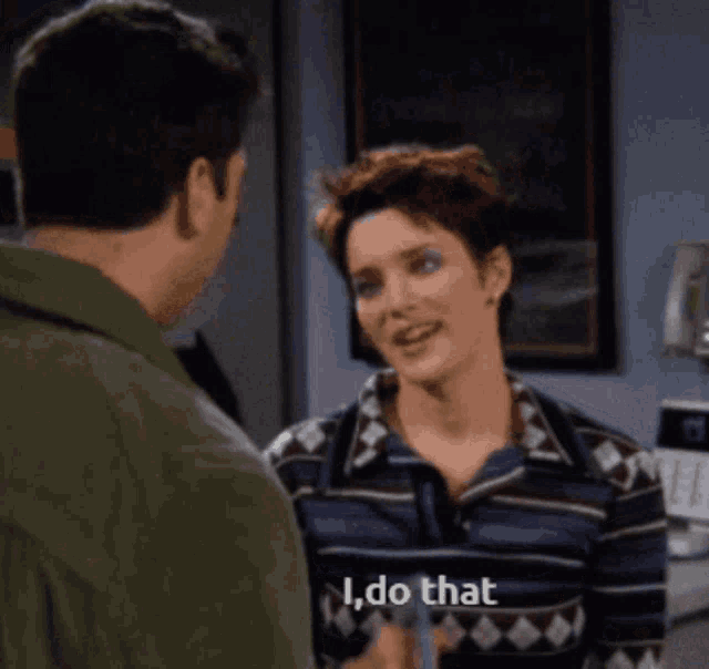 a man and a woman are talking and the woman is saying i do that