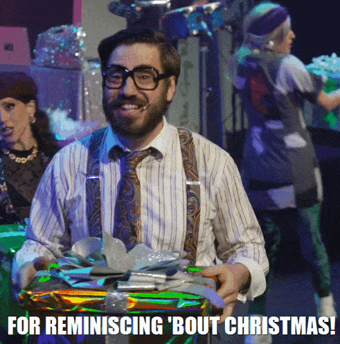 a man wearing suspenders and glasses is holding a gift box with the words for reminding bout christmas on the bottom