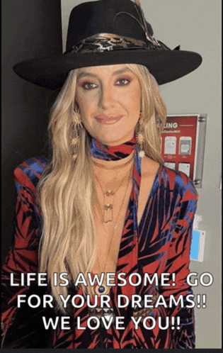 a woman wearing a cowboy hat says life is awesome