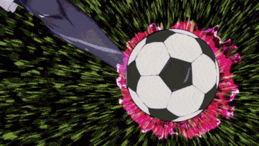 a soccer ball is being kicked in the air by a player