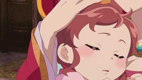 a girl with red hair is being held by a woman in a red dress
