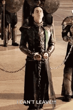 loki in chains is standing in front of a group of soldiers and says `` i can 't leave ! ''
