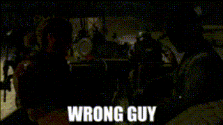 a silhouette of a man in a hat with the words wrong guy on the bottom