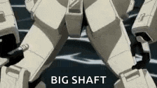 a close up of a robot with the words `` big shaft '' written below it .
