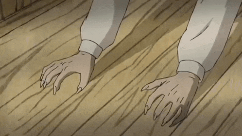 a cartoon character is crawling on a wood floor
