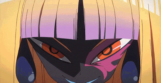a close up of a cartoon character 's face with yellow hair