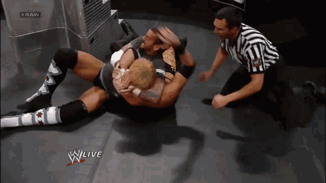 a wrestling match is being broadcasted on raw