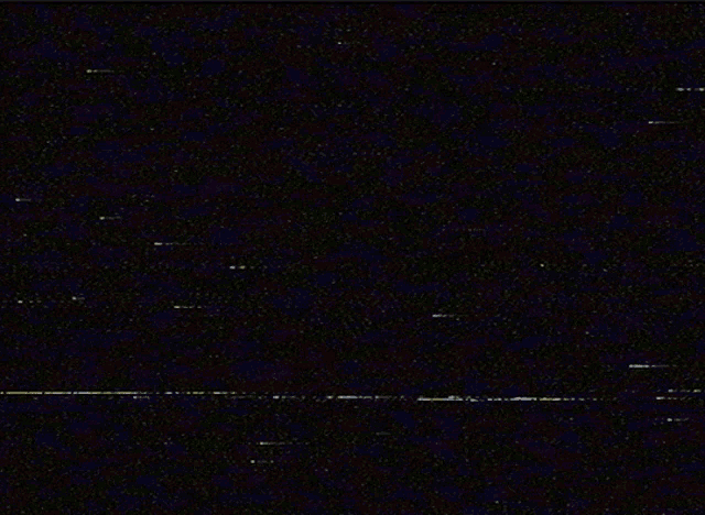 a dark background with a few lines of light on it