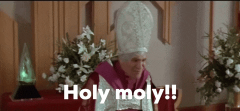 a priest is sitting in a church and says holy moly