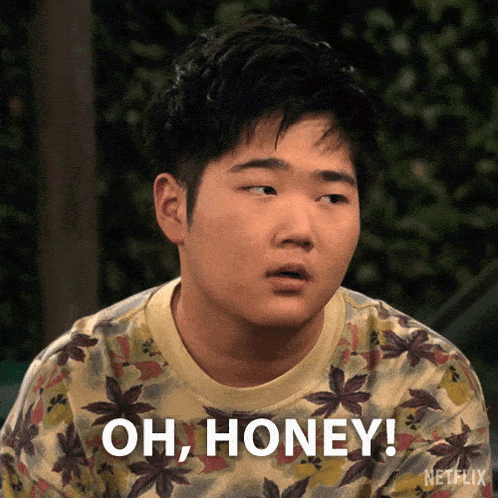 a young man with a floral shirt says oh honey